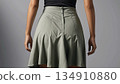 Woman in knee-length skirt 134910880
