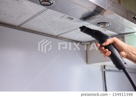 Utilizing Steam Cleaning Techniques on Kitchen Hood Filters for Effective Deep Cleaning Tasks Utilizing Steam Cleaning Techniques on Kitchen Hood Filters for Effective Deep Cleaning Tasks 134911398