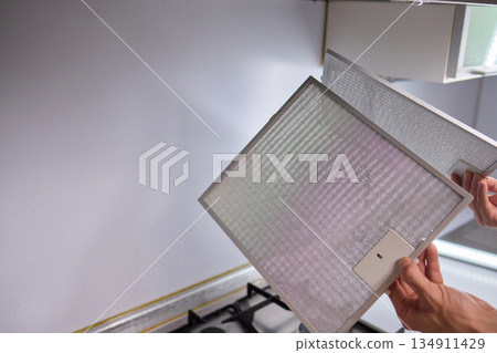 Utilizing Steam Cleaning Techniques on Kitchen Hood Filters for Effective Deep Cleaning Tasks 134911429