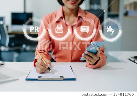PR, Public relations concept. hands using laptop and tablet with public relations icon for communication advertising marketing strategy. with Ads and sales 134911700