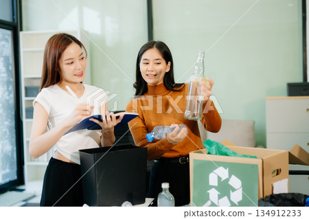 Eco friendly teamwork with this office recycling scene. Perfect for showcasing sustainability, collaboration, Eco friendly teamwork with this office recycling scene. Perfect for showcasing sustainability, collaboration, 134912233