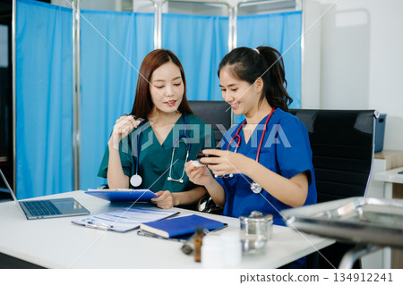 doctors and nurses working together in a modern office, showcasing healthcare teamwork, consultation, and professional care doctors and nurses working together in a modern office, showcasing healthcare teamwork, consultation, and professional care 134912241