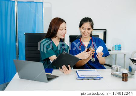 doctors and nurses working together in a modern office, showcasing healthcare teamwork, consultation, and professional care doctors and nurses working together in a modern office, showcasing healthcare teamwork, consultation, and professional care 134912244