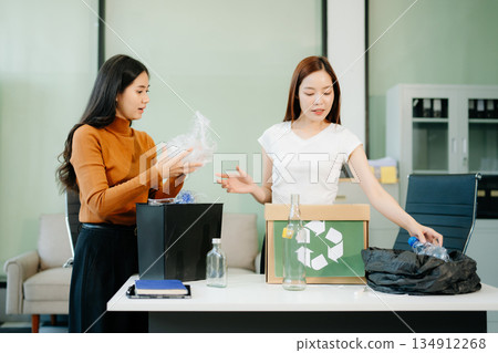 Eco friendly teamwork with this office recycling scene. Perfect for showcasing sustainability, collaboration, Eco friendly teamwork with this office recycling scene. Perfect for showcasing sustainability, collaboration, 134912268