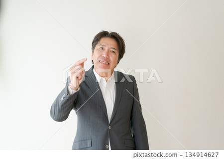 An irritated office worker in his 50s 134914627