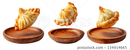 Set of Sambousek small crescent baked dumpling with twisted and pinched crust with cheese or meat, isolated on white background Set of Sambousek small crescent baked dumpling with twisted and pinched crust with cheese or meat, isolated on white background 134914665
