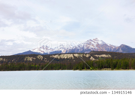 Scenic view to cyan cold waters of the mountain lake. 134915146