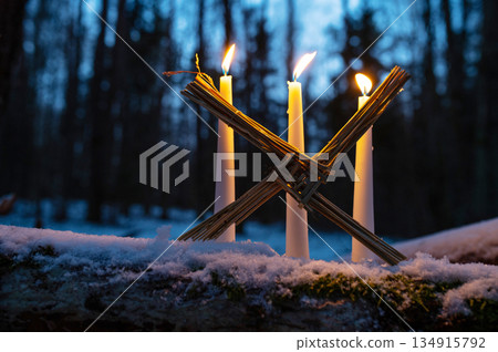 Saint Brigids Cross Irish pagan symbol with daisy of house blessing protection from evil and fire. 134915792