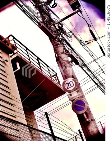 Background material of an urban landscape with electric poles and power lines intersecting 134916075