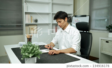 Audit concept,Bookkeeper or financial inspector and secretary making report Financial Planning Report in Spreadsheet Audit concept,Bookkeeper or financial inspector and secretary making report Financial Planning Report in Spreadsheet 134916178