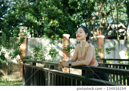 Women relax peaceful nature calm lifestyle and wellness moment during outdoor workout break Women relax peaceful nature calm lifestyle and wellness moment during outdoor workout break 134916204