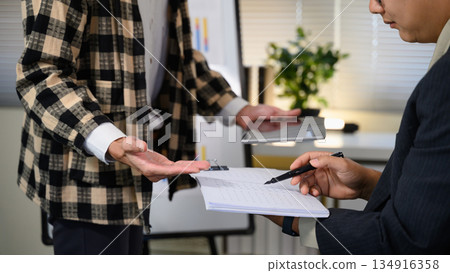 Pitching series photo, Closeup man presenting and pitching business ideas at boardroom. 134916358
