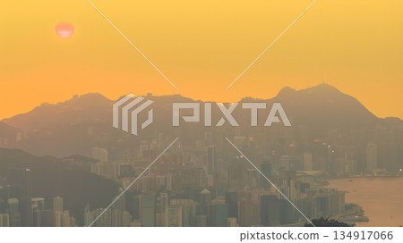 Hong Kong skyline glowing in warm golden light Dec 28 2025 Hong Kong skyline glowing in warm golden light Dec 28 2025 134917066