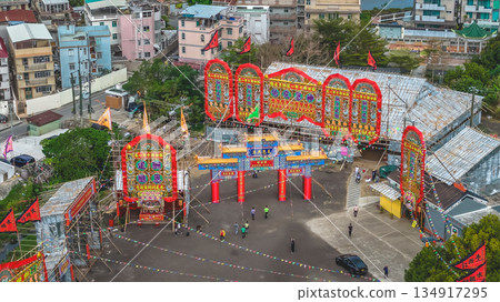 Dec 20 2025 Colorful Festival Arch Over Busy Street, Kam Tin Jiao Festival 134917295