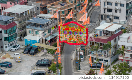 Dec 20 2025 Colorful Festival Arch Over Busy Street, Kam Tin Jiao Festival Dec 20 2025 Colorful Festival Arch Over Busy Street, Kam Tin Jiao Festival 134917300