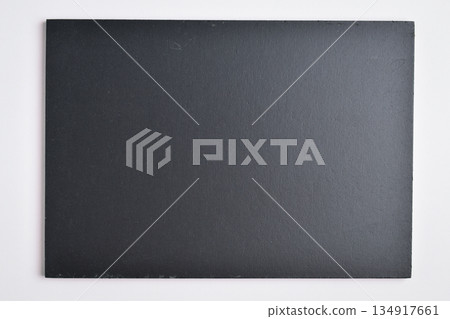 blank black notebook on white background 134917661