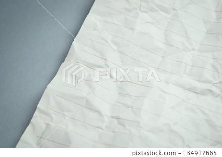 crumpled line paper texture on grey background, blank sheet notebook crumpled line paper texture on grey background, blank sheet notebook 134917665