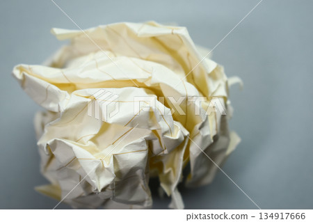 round lump paper on grey background, recycle used paper round lump paper on grey background, recycle used paper 134917666