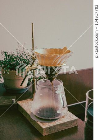 Hand Drip Coffee Extracting into Glass Server 134917782