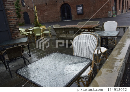 Outdoor tables at a restaurant after the rain in Dumbo, Brooklyn, New York Outdoor tables at a restaurant after the rain in Dumbo, Brooklyn, New York 134918052