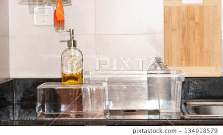 Rectangular transparent plastic container for food storage, ideal for packaging and preserving freshness. High quality photo Rectangular transparent plastic container for food storage, ideal for packaging and preserving freshness. High quality photo 134918579