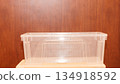 Rectangular transparent plastic container for food storage, ideal for packaging and preserving freshness. High quality photo 134918592