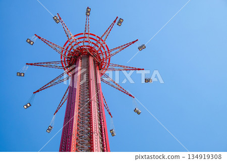 Ferris wheel on the background of blue sky 134919308