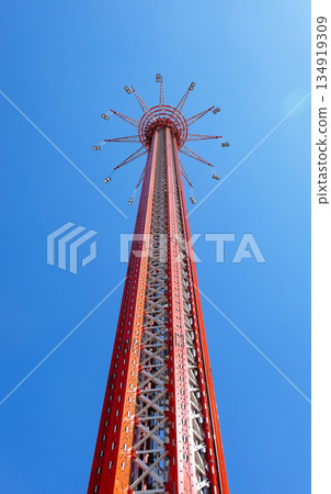 Ferris wheel on the background of blue sky 134919309