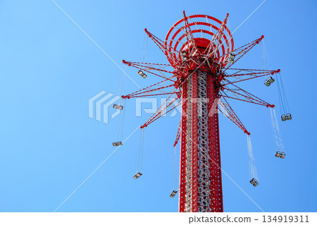 Ferris wheel on the background of blue sky Ferris wheel on the background of blue sky 134919311
