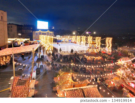 Ice rink on Christmas market on Rose Revolution square at twilight - Christmas lights Ice rink on Christmas market on Rose Revolution square at twilight - Christmas lights 134919914