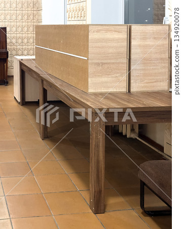 Stacked wooden cabinets in interior space 134920078