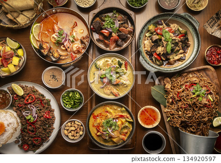 many different thai food dishes on table in modern restaurant in bangkok thailand many different thai food dishes on table in modern restaurant in bangkok thailand 134920597