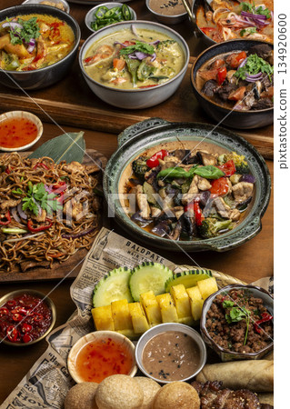 many different thai food dishes on table in modern restaurant in bangkok thailand 134920600
