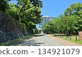 Wakayama Castle's stone walls and promenade surrounded by blue skies and fresh greenery 134921079