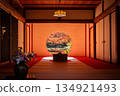 Autumn leaves seen through a round window in a Japanese-style room at Meigetsu-in Temple in Kamakura 134921493
