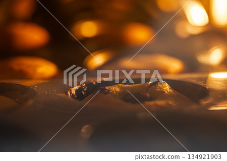 Golden pound cake rising in the oven 134921903