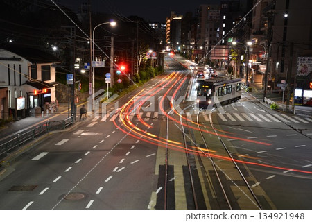 Light trails of cars running in the city at night 134921948