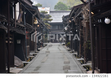 Old townscape of Takayama City, Gifu Prefecture, Japan. Old houses exuding a sense of history. Morning scene during the Takayama Spring Festival. 134922161
