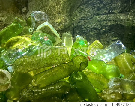 bottom of the sea contaminated by bottles, bags and other plastic materials 134922185