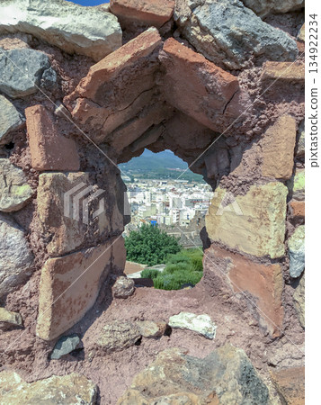 city seen through the window of the old castle city seen through the window of the old castle 134922234