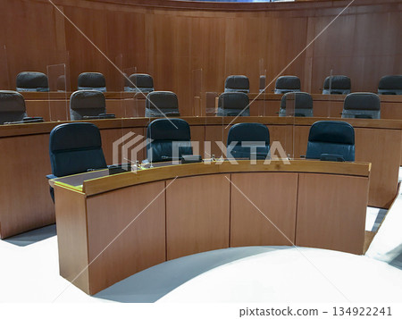 multitude of seats in parliament with audio equipment to communicate multitude of seats in parliament with audio equipment to communicate 134922241