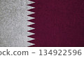 Flag of Qatar on an ancient concrete surface. Concept of Qatari heritage and patriotism.. 134922596