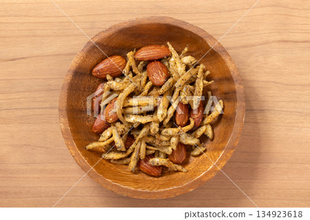 Fried smelt, almonds, salt and pepper 134923618