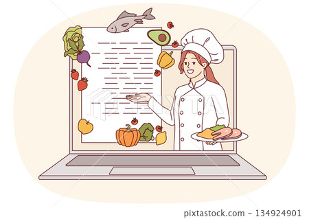 Online cooking course from woman chef looking out of laptop screen and recommending recipe 134924901