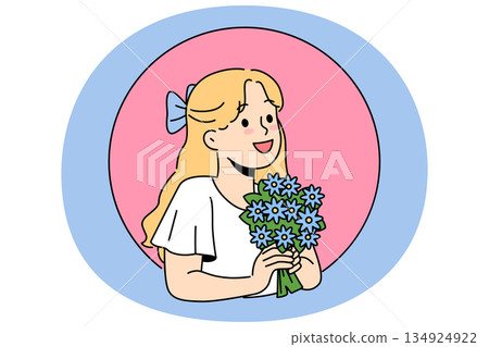 Little girl with bouquet wildflowers, rejoicing at change season or preparing flowers for mother day 134924922