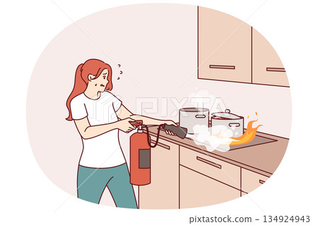 Woman puts out fire in kitchen with fire extinguisher, and panics for fear of combustion spreading 134924943