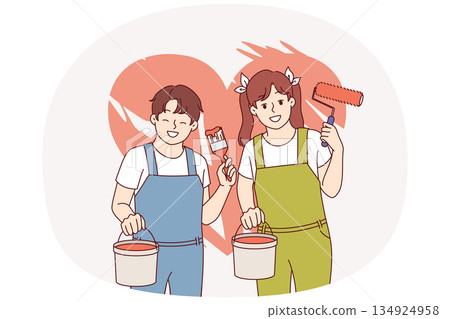 Little boy and girl painted heart on wall using bucket of paint and roller with brush Little boy and girl painted heart on wall using bucket of paint and roller with brush 134924958