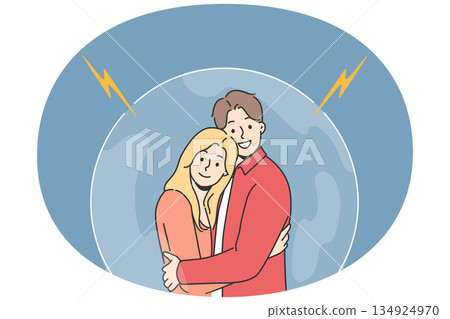 Couple in love hugs, standing in cocoon, feeling safe and secure thanks to presence of other half 134924970