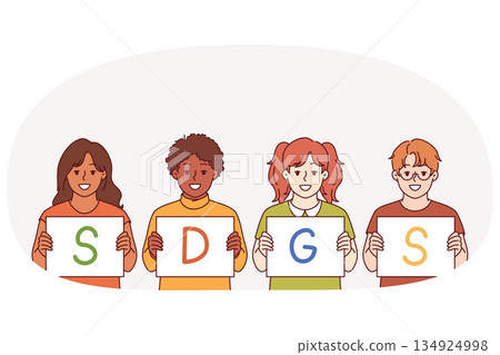 SDGS letters in hands of children calling to define and comply with sustainable development goals 134924998