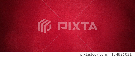 Dark red suede fabric background with matte velvet texture, wine tones and soft felt surface with vignette in macro 134925031